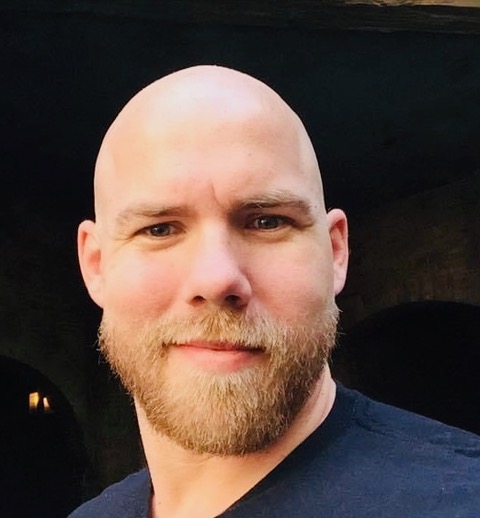 Head shot of Tim Sta